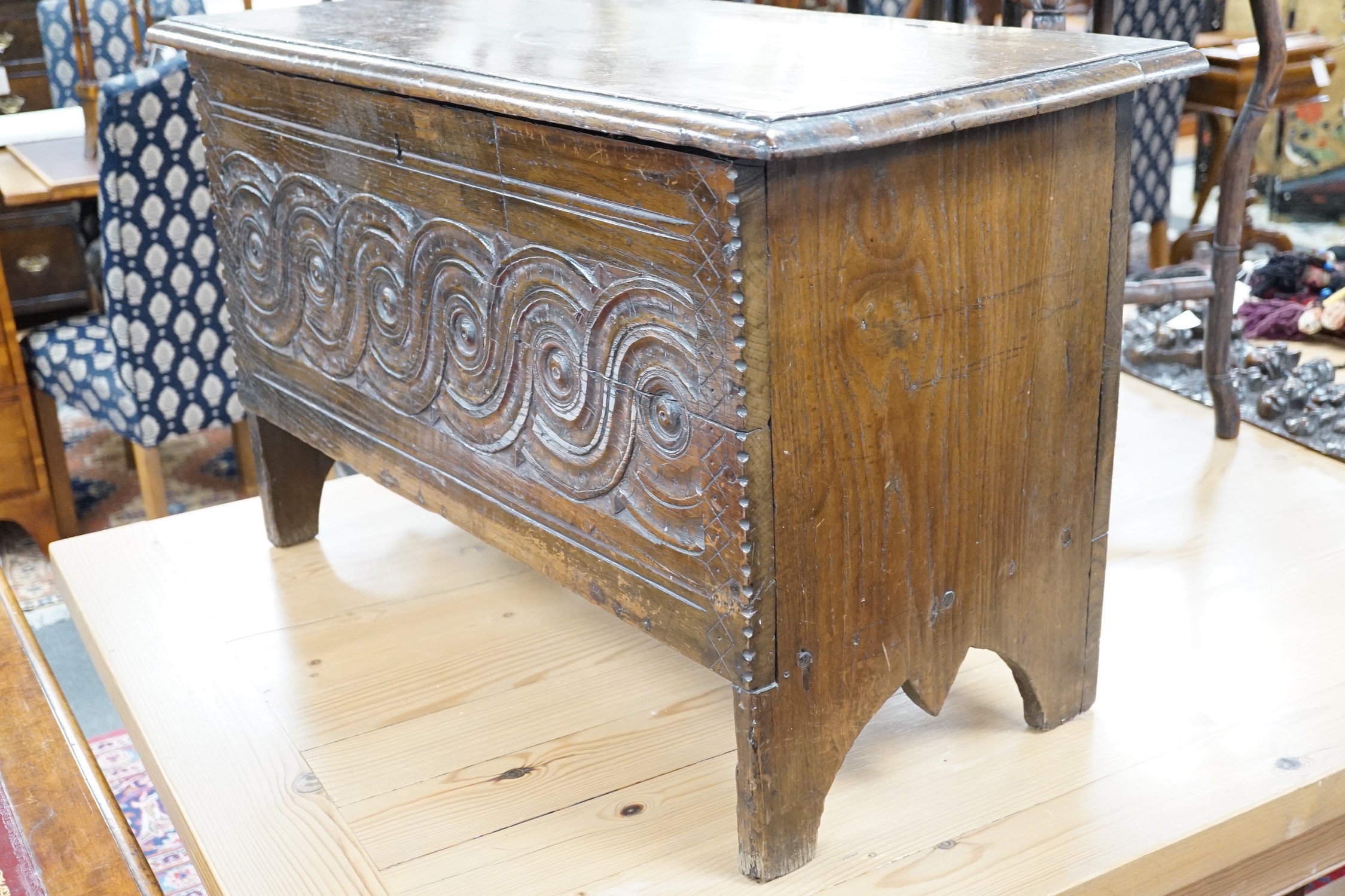 A 17th century style carved oak coffer, width 84cm *Please note the sale commences at 9am.